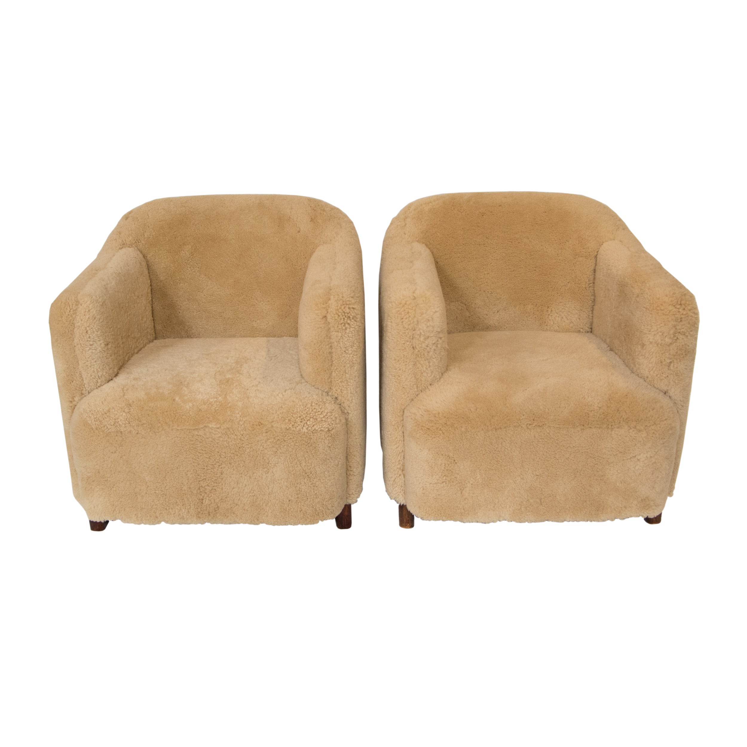 #23 Pair of Lounge Chairs in sheep skin